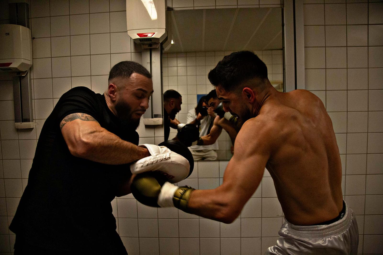Argjent Shala on the pads with his coach