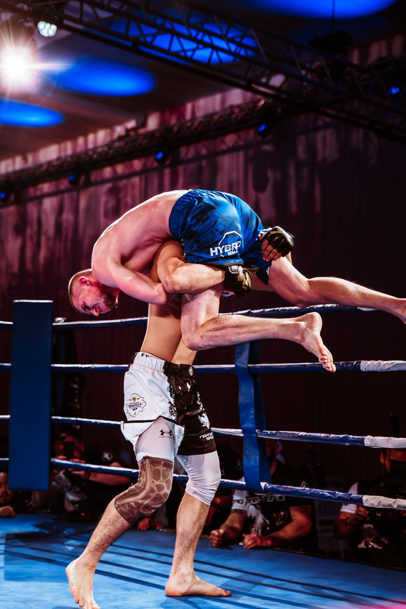 Argjent Shala slamming an opponent in the cage