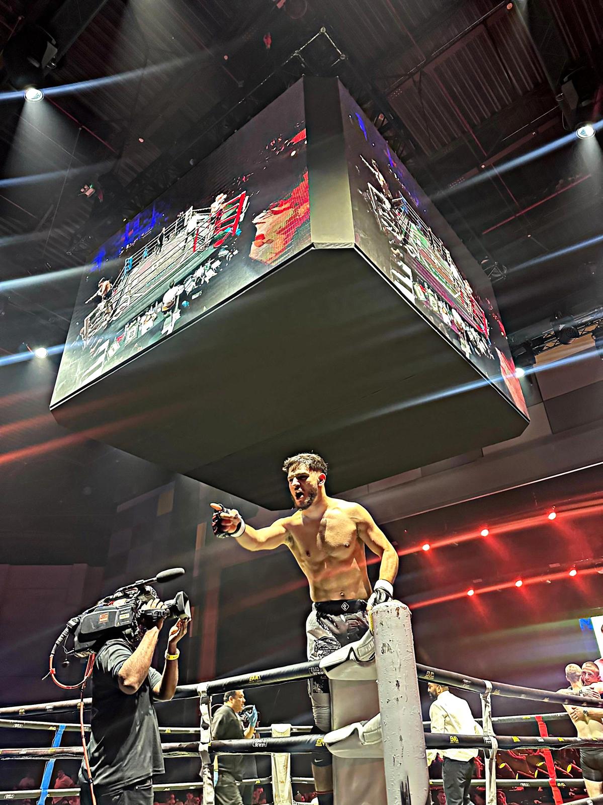 Argjent Shala celebrating a victory in the ring